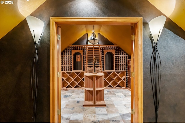 wine room with a textured wall