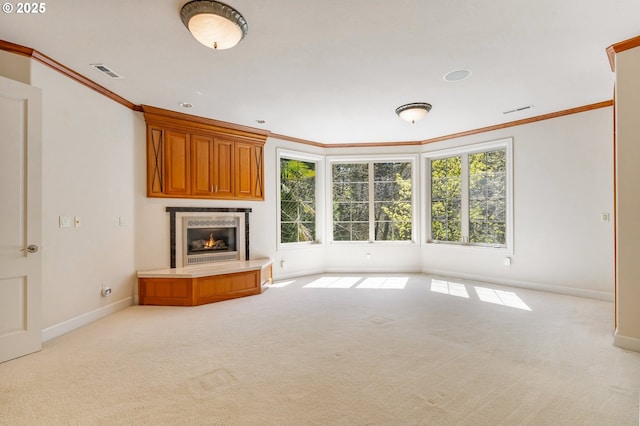 unfurnished living room featuring baseboards, carpet, and visible vents