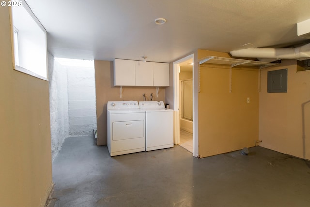 1522 N Rosa Parks Way, Portland, OR 97217 - clothes washing area with cabinet space, electric panel, and separate washer and dryer