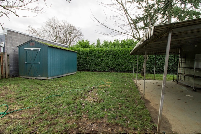 1522 N Rosa Parks Way, Portland, OR 97217 - view of yard with an outdoor structure, fence, a patio, and a storage unit