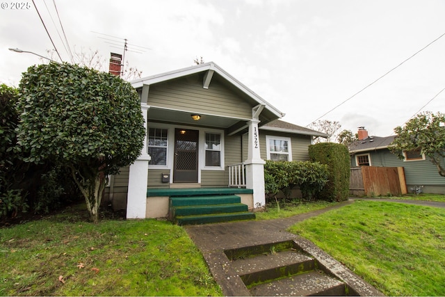 1522 N Rosa Parks Way, Portland, OR 97217 - bungalow-style home with covered porch and a front yard