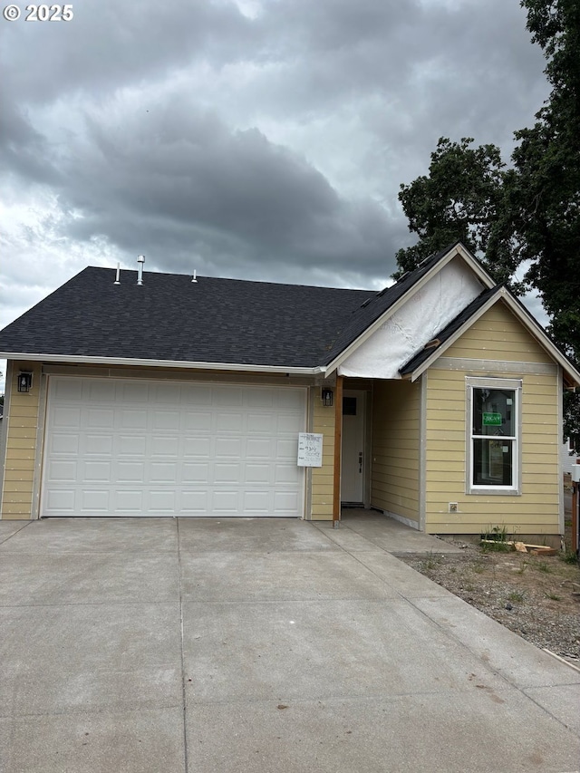 9314 Glory Ct NE, Salem, OR 97305 - ranch-style house featuring driveway, a garage, and a shingled roof