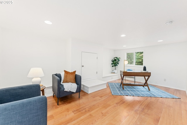 office area with recessed lighting, baseboards, and light wood-style flooring