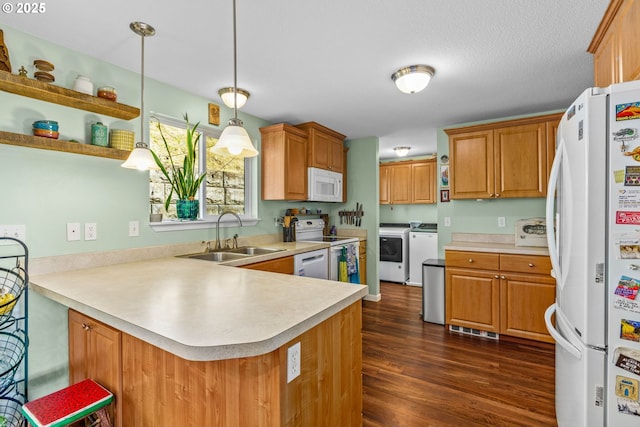 34637 E Knox Butte Rd, Albany, OR 97322 - kitchen featuring white appliances, a sink, washer and clothes dryer, open shelves, and a peninsula