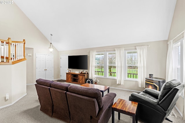 40510 NE 261st Ct, Amboy, WA 98601 - living area with high vaulted ceiling, carpet, and a healthy amount of sunlight