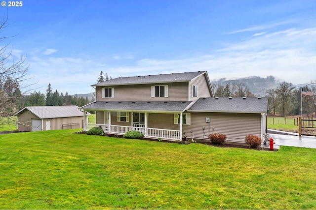 40510 NE 261st Ct, Amboy, WA 98601 - back of property with a yard, a mountain view, and covered porch