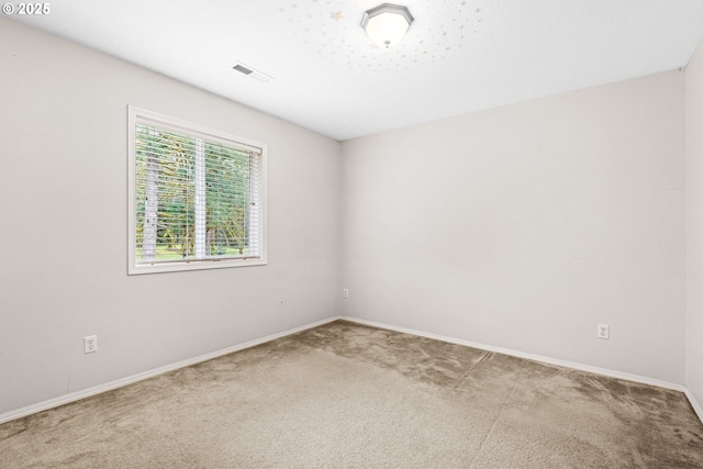 40510 NE 261st Ct, Amboy, WA 98601 - spare room with carpet flooring, visible vents, and baseboards