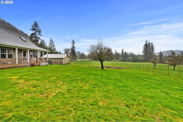 40510 NE 261st Ct, Amboy, WA 98601 - view of yard with a rural view, a wooden deck, and fence