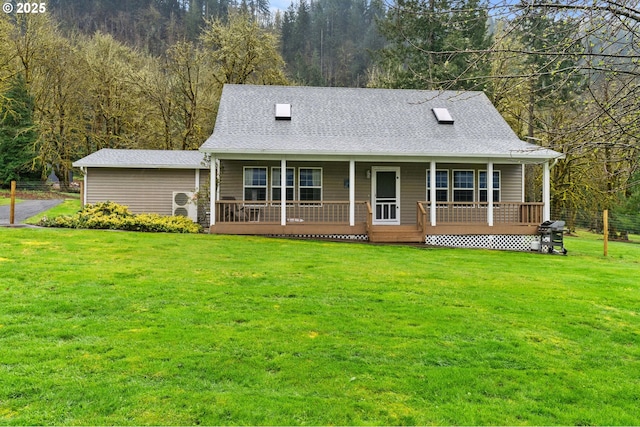 40510 NE 261st Ct, Amboy, WA 98601 - country-style home featuring a porch, a front lawn, and roof with shingles