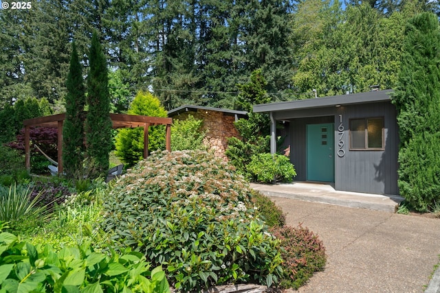 ranch-style home with stone siding