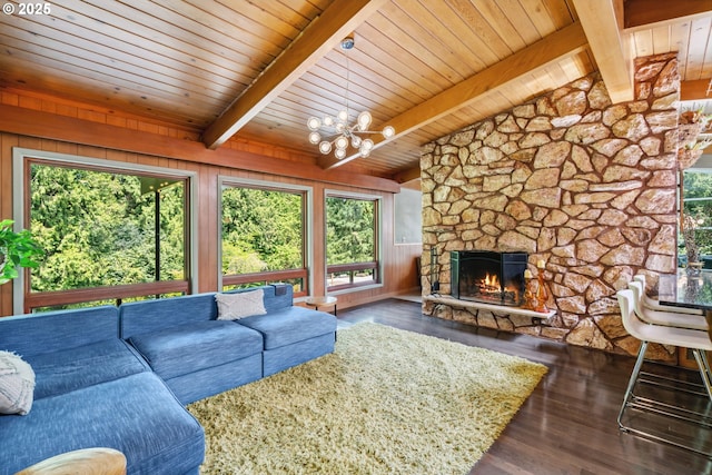living area with a notable chandelier, wooden ceiling, vaulted ceiling with beams, and wood finished floors