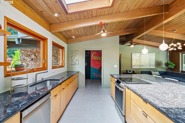 kitchen featuring light brown cabinetry, appliances with stainless steel finishes, a sink, dark stone counters, and wood ceiling