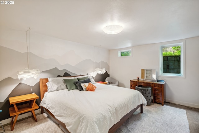 carpeted bedroom featuring baseboards