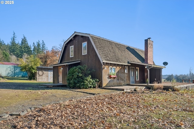 exterior space featuring a shed