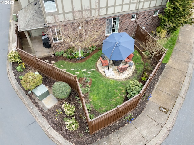 view of yard with a patio and a fenced backyard