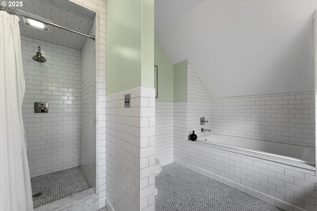 2225 NE 22nd Ave, Portland, OR 97212 - full bathroom with a stall shower, vaulted ceiling, a garden tub, and tile walls