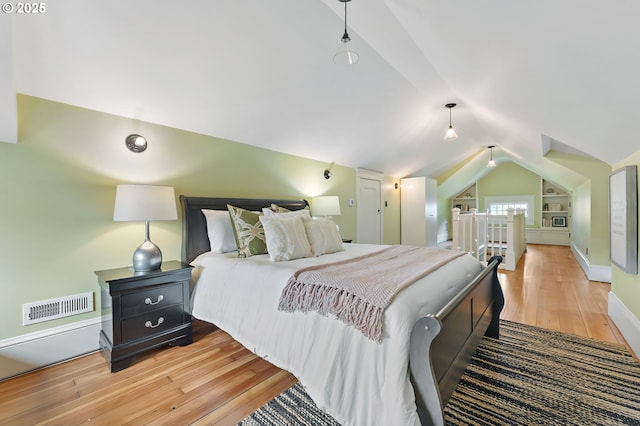 2225 NE 22nd Ave, Portland, OR 97212 - bedroom with light wood finished floors and vaulted ceiling