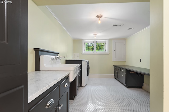 2225 NE 22nd Ave, Portland, OR 97212 - washroom featuring washing machine and clothes dryer, crown molding, and cabinet space