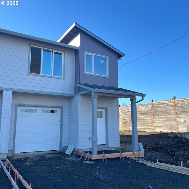 view of front of home with a garage