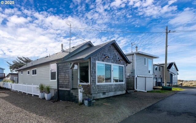 128 NW 20th Ave, Rockaway Beach, OR 97136 - view of front of house with entry steps