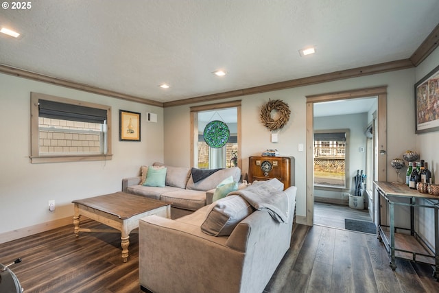 128 NW 20th Ave, Rockaway Beach, OR 97136 - living room with ornamental molding, dark wood-style floors, healthy amount of natural light, baseboards, and recessed lighting