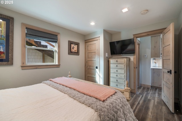 128 NW 20th Ave, Rockaway Beach, OR 97136 - bedroom featuring dark wood-style floors and recessed lighting