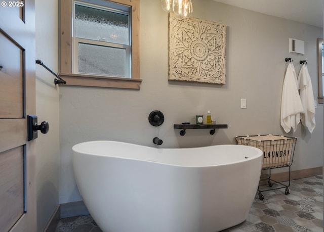 128 NW 20th Ave, Rockaway Beach, OR 97136 - full bathroom with a soaking tub and baseboards