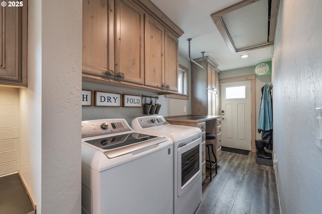 128 NW 20th Ave, Rockaway Beach, OR 97136 - washroom featuring separate washer and dryer, cabinet space, attic access, and dark wood-style flooring