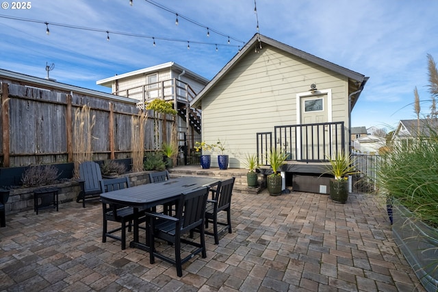 128 NW 20th Ave, Rockaway Beach, OR 97136 - view of patio featuring fence and outdoor dining area