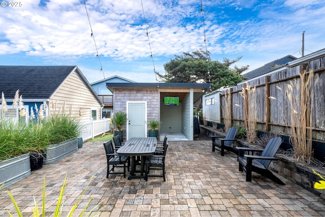 128 NW 20th Ave, Rockaway Beach, OR 97136 - view of patio / terrace with a fenced backyard and outdoor dining area