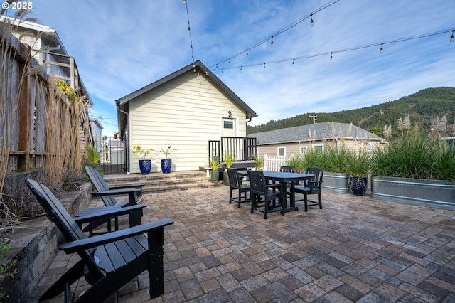 128 NW 20th Ave, Rockaway Beach, OR 97136 - view of patio / terrace with outdoor dining area and fence