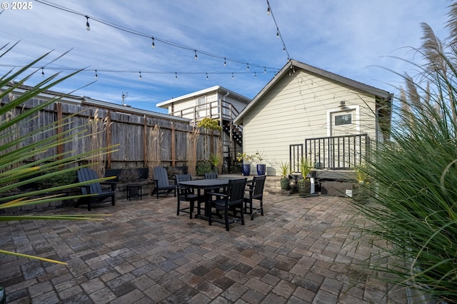 128 NW 20th Ave, Rockaway Beach, OR 97136 - view of patio with fence and outdoor dining space