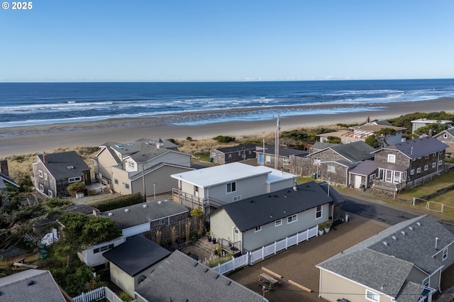 128 NW 20th Ave, Rockaway Beach, OR 97136 - aerial perspective of suburban area featuring extended coastline