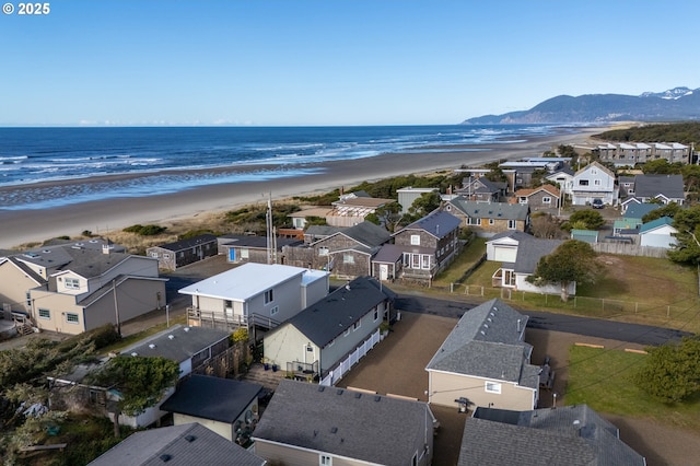 128 NW 20th Ave, Rockaway Beach, OR 97136 - aerial perspective of suburban area with a water and mountain view