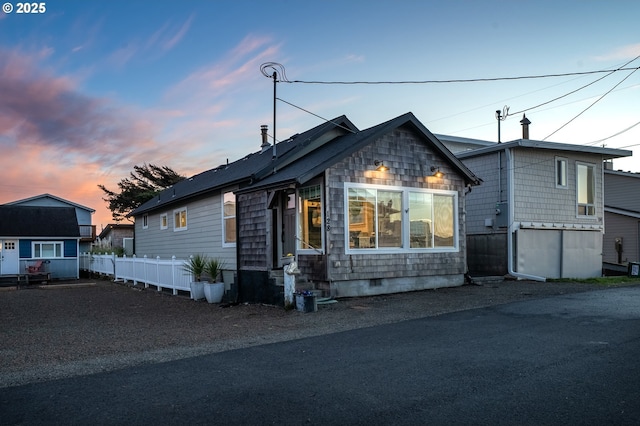 128 NW 20th Ave, Rockaway Beach, OR 97136 - view of front facade with fence
