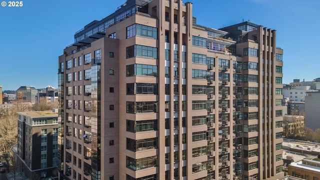 view of building exterior with a city view