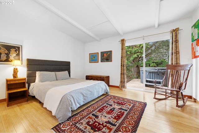 bedroom with baseboards, vaulted ceiling with beams, light wood-style floors, and access to outside