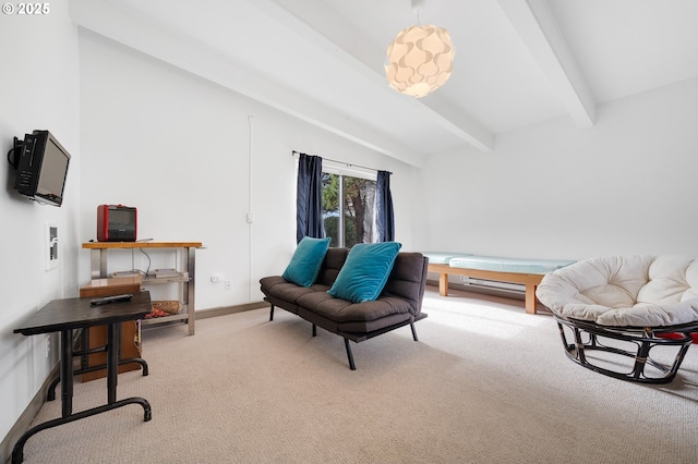 sitting room with baseboards, vaulted ceiling with beams, and carpet flooring