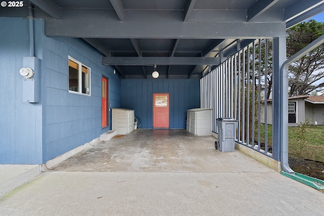 exterior space featuring a carport