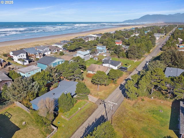 birds eye view of property featuring a residential view and a beach view