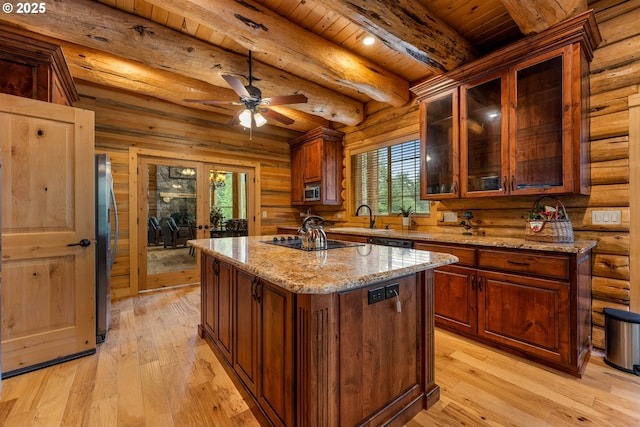 400 Rockinghorse Dr, Grants Pass, OR 97527 - kitchen featuring a sink, black electric stovetop, freestanding refrigerator, beamed ceiling, and wooden ceiling