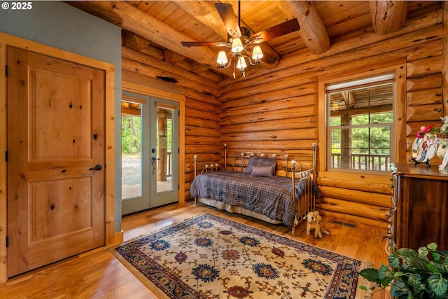 400 Rockinghorse Dr, Grants Pass, OR 97527 - bedroom with access to outside, french doors, wood ceiling, multiple windows, and beam ceiling