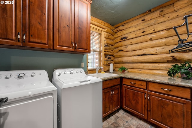 400 Rockinghorse Dr, Grants Pass, OR 97527 - clothes washing area with cabinet space, log walls, and washer and dryer