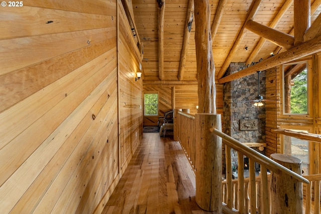 400 Rockinghorse Dr, Grants Pass, OR 97527 - hall featuring wooden ceiling, an upstairs landing, beam ceiling, hardwood / wood-style flooring, and wooden walls