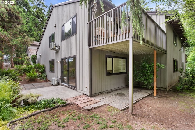 7124 SW Murray Blvd, Beaverton, OR 97008 - rear view of property with a patio area and a wooden deck