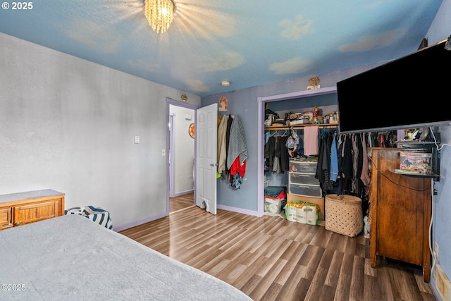 5053 NE 50th St, Neotsu, OR 97364 - bedroom featuring wood finished floors and a closet