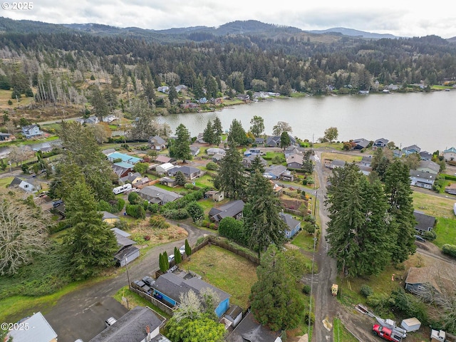 5053 NE 50th St, Neotsu, OR 97364 - aerial overview of property's location with a water and mountain view and nearby suburban area