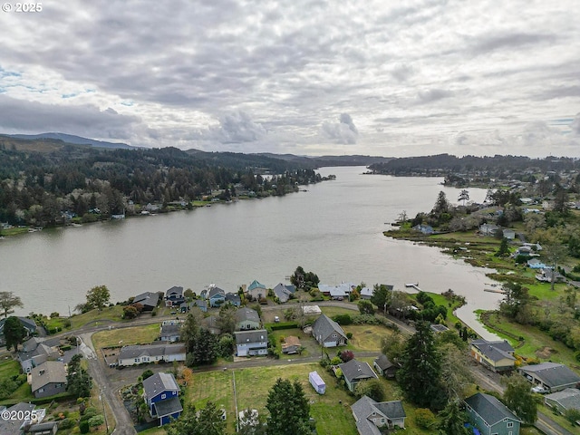 5053 NE 50th St, Neotsu, OR 97364 - aerial overview of property's location with a large body of water and nearby suburban area