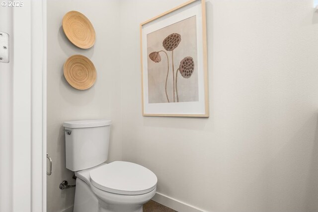 2415 NE 38th Ave Unit B, Portland, OR 97212 - bathroom featuring baseboards and toilet