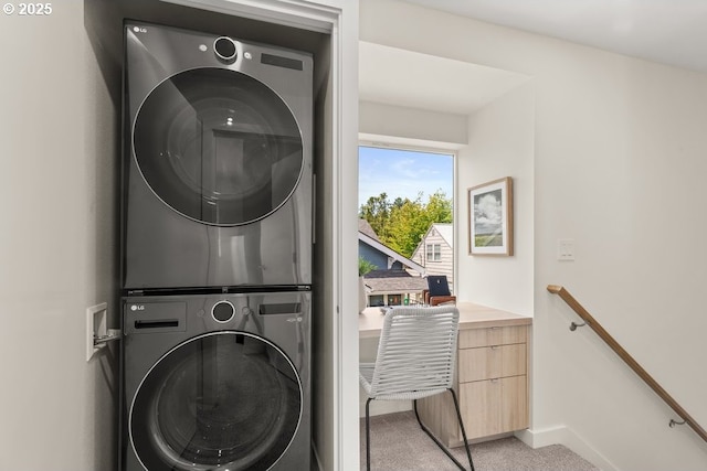 2415 NE 38th Ave Unit B, Portland, OR 97212 - laundry area with stacked washer / dryer and light colored carpet